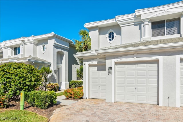 view of front of property featuring a garage