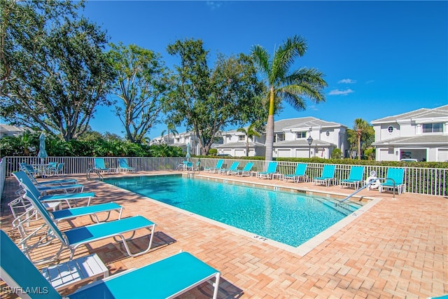 view of pool featuring a patio area