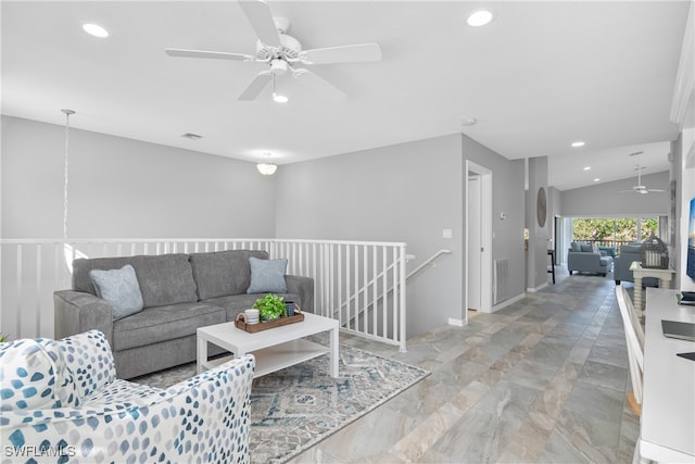 living room with ceiling fan and lofted ceiling