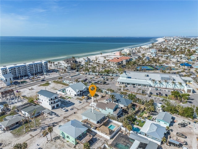 aerial view featuring a water view and a beach view