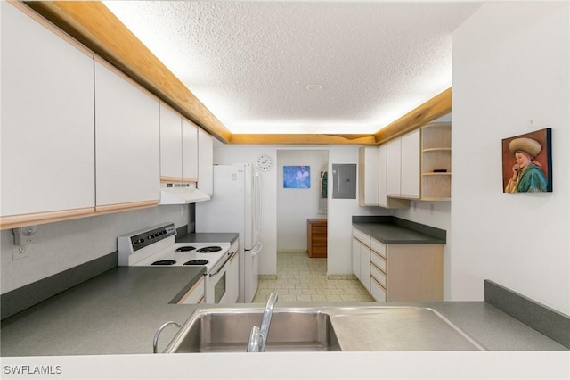 kitchen featuring electric stove, electric panel, a tray ceiling, a textured ceiling, and white cabinets