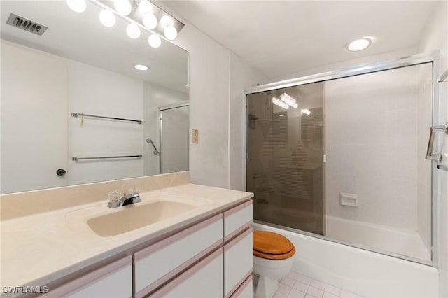 full bathroom with enclosed tub / shower combo, vanity, toilet, and tile patterned floors