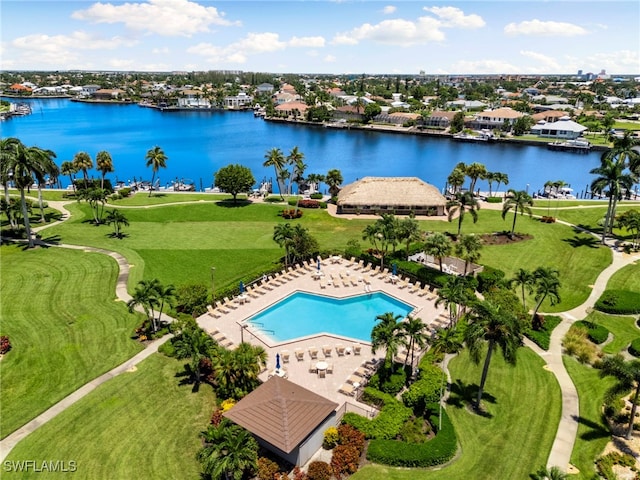 birds eye view of property featuring a water view