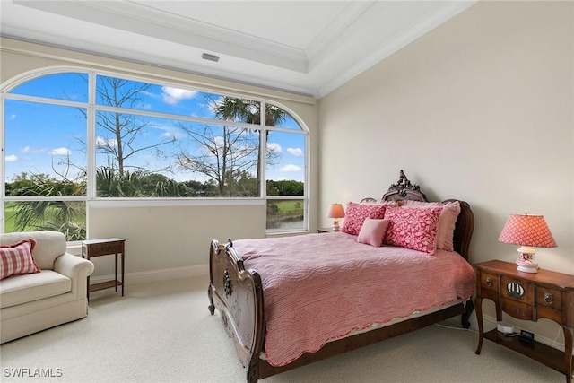 bedroom featuring light colored carpet and ornamental molding