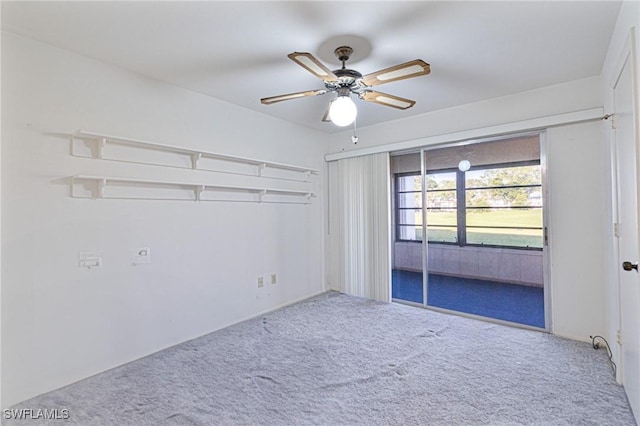 unfurnished bedroom with carpet and ceiling fan