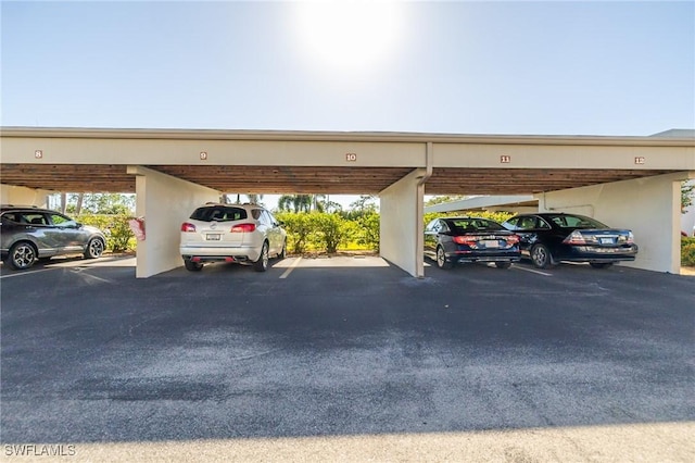 view of parking with a carport