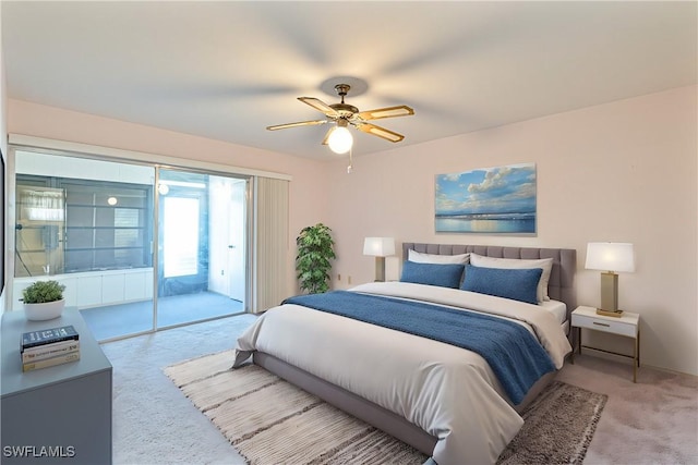 carpeted bedroom featuring access to outside and ceiling fan