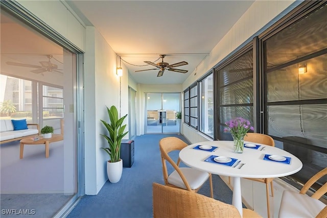 sunroom / solarium with ceiling fan and plenty of natural light