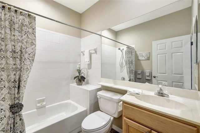 full bathroom featuring vanity, toilet, and shower / bath combo with shower curtain