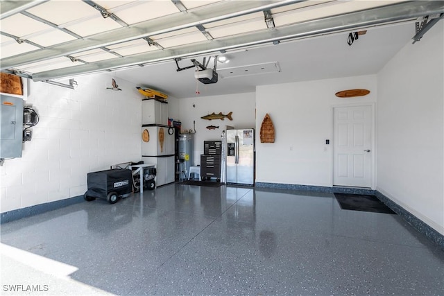 garage with electric water heater, a garage door opener, and stainless steel refrigerator with ice dispenser