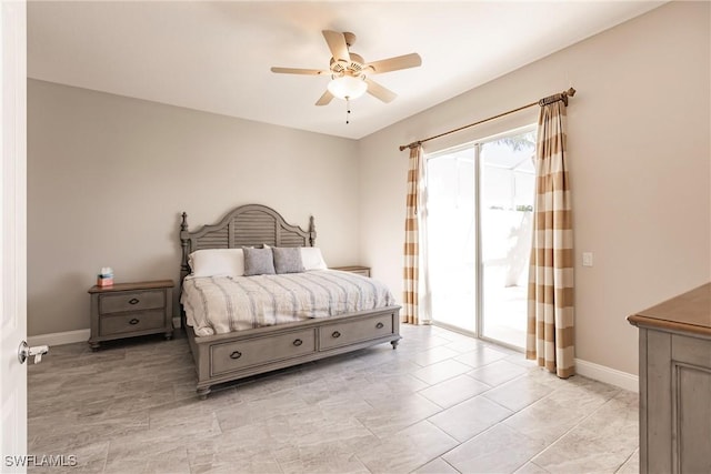 bedroom featuring access to exterior, baseboards, and a ceiling fan