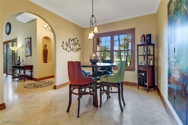 dining room with ornamental molding