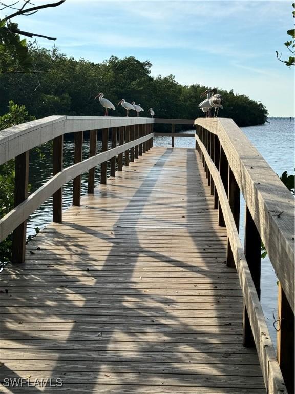 view of dock with a water view