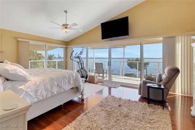 bedroom featuring ceiling fan, hardwood / wood-style floors, and high vaulted ceiling