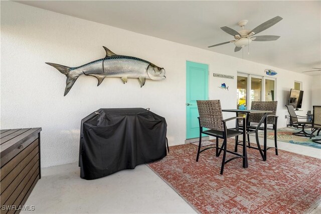 view of patio / terrace with ceiling fan and area for grilling