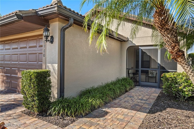 exterior space with a garage