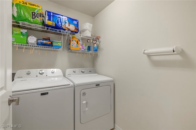 laundry area with washer and clothes dryer