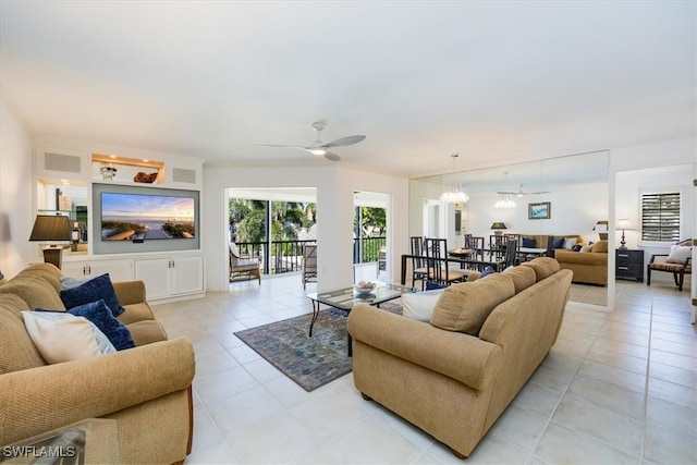 tiled living room featuring ceiling fan and ornamental molding