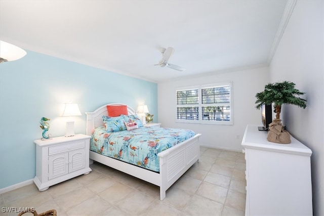 bedroom with ceiling fan and crown molding