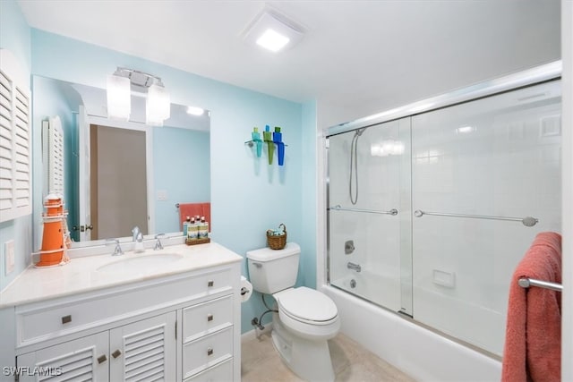 full bathroom with tile patterned flooring, vanity, toilet, and bath / shower combo with glass door