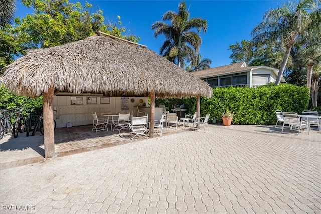 view of community with a patio area