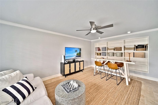 living room featuring ceiling fan and ornamental molding