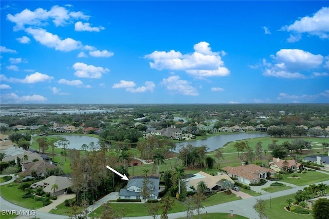 drone / aerial view with a water view