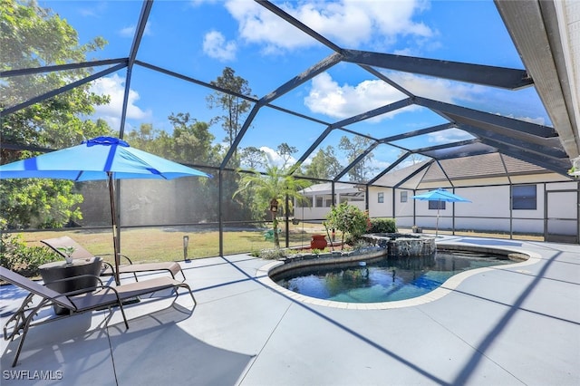 view of swimming pool with a lawn, a lanai, a patio, and an in ground hot tub