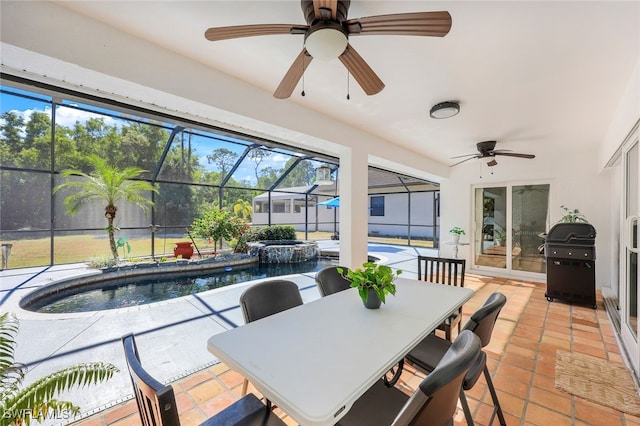 exterior space with a wealth of natural light and ceiling fan