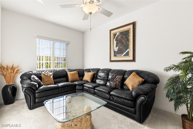 living room with ceiling fan and carpet floors