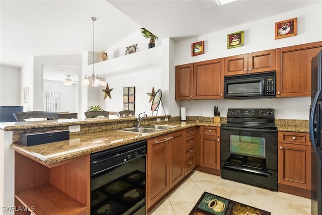 kitchen with sink, hanging light fixtures, kitchen peninsula, vaulted ceiling, and black appliances