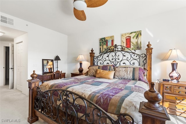 carpeted bedroom featuring ceiling fan