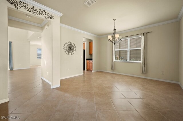 empty room featuring a notable chandelier, light tile patterned flooring, and ornamental molding