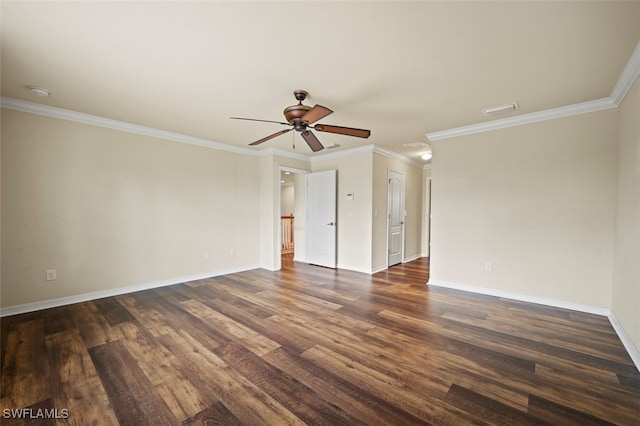 spare room featuring dark wood-type flooring, ceiling fan, and ornamental molding