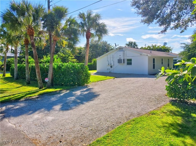 view of home's exterior featuring a lawn