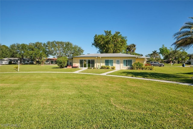 ranch-style home with a front yard