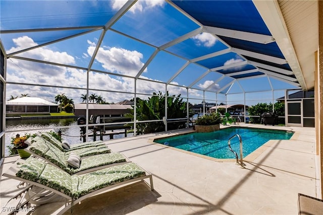 view of swimming pool featuring a lanai, a water view, and a patio