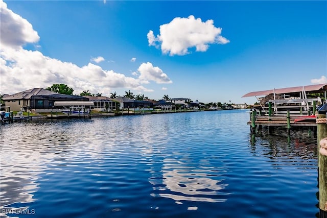 exterior space with a water view