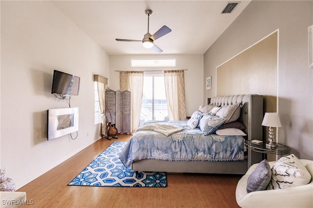 bedroom featuring ceiling fan and wood-type flooring