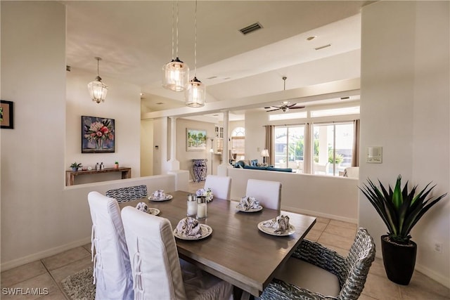 dining area featuring ceiling fan and light tile patterned flooring