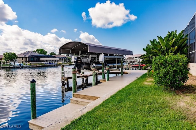 dock area with a water view