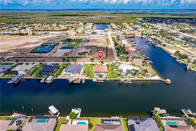 drone / aerial view with a water view