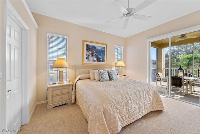 bedroom featuring access to exterior, ceiling fan, light colored carpet, and multiple windows