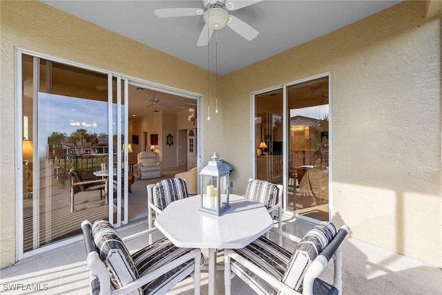 sunroom / solarium with ceiling fan