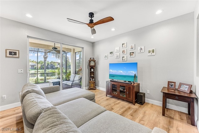 living room with light hardwood / wood-style flooring