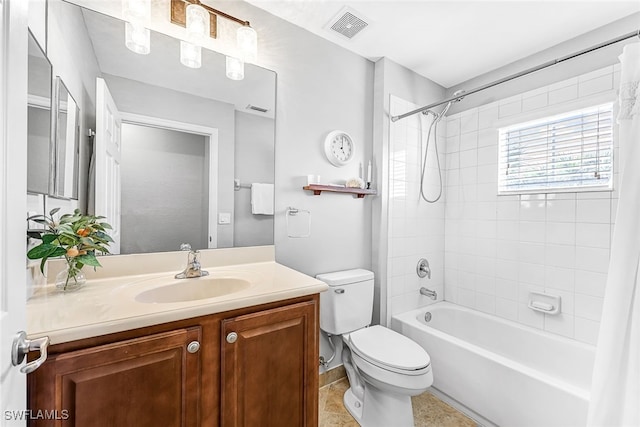 full bathroom featuring tile patterned flooring, vanity, toilet, and shower / bathtub combination with curtain