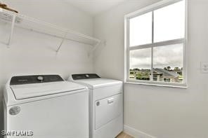 laundry room featuring independent washer and dryer