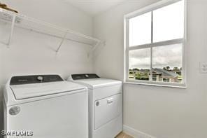 laundry area with washer and clothes dryer