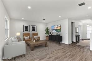 living room with hardwood / wood-style floors