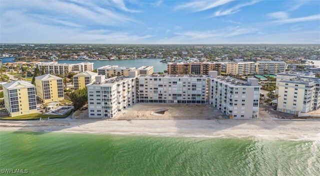 bird's eye view with a beach view and a water view